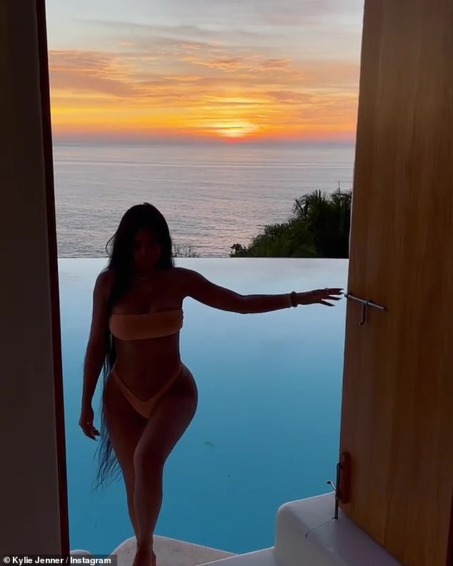 Sunset Girl: Kylie added a video showing herself shaded in front of the pretty scene