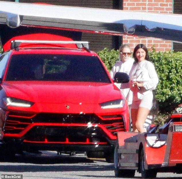 Travel in style: Kylie Jenner is spotted flying to her private jet in Los Angeles on Tuesday afternoon in a red Lamborghini
