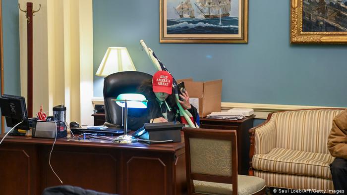 A Trump supporter occupies the office of a deputy on the Capitol
