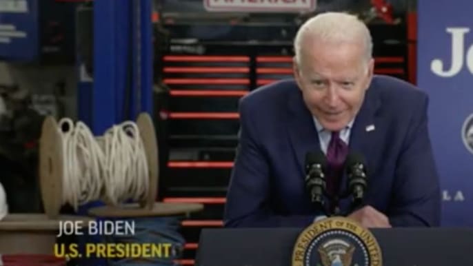 Why does US President Joe Biden whisper in his speeches?