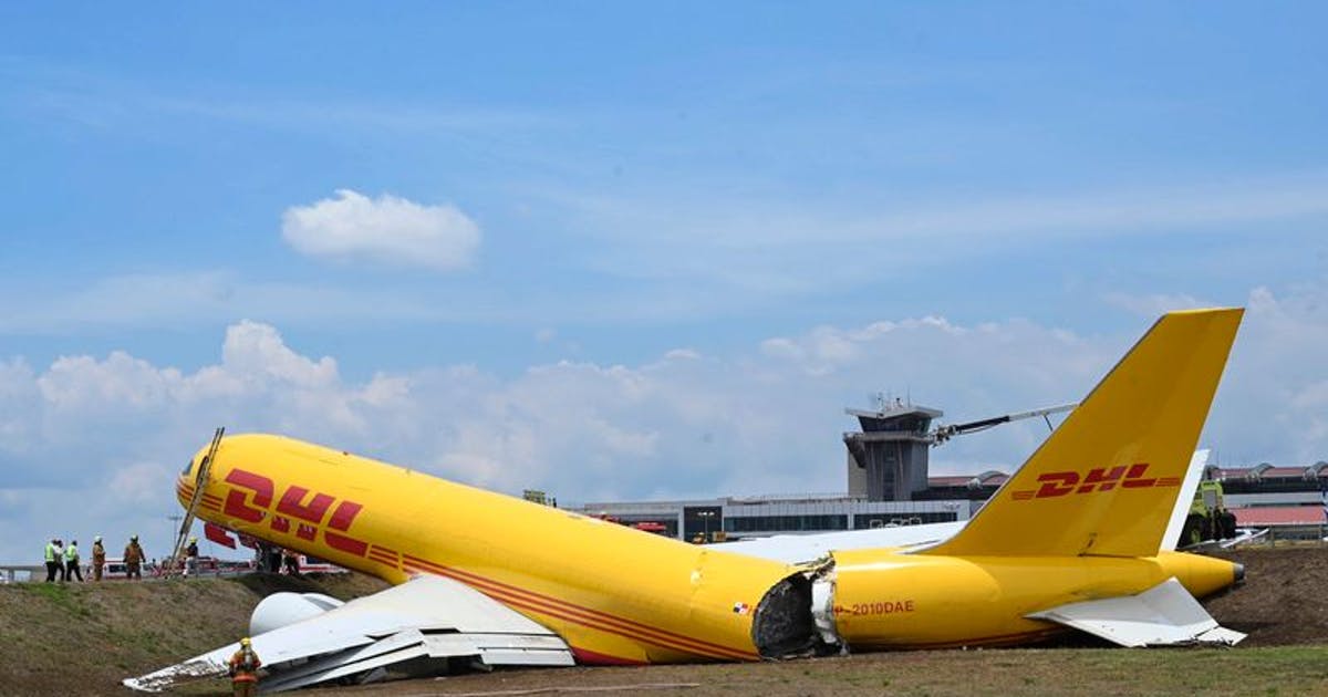Costa Rica.  A DHL cargo plane splits in two as it lands.
