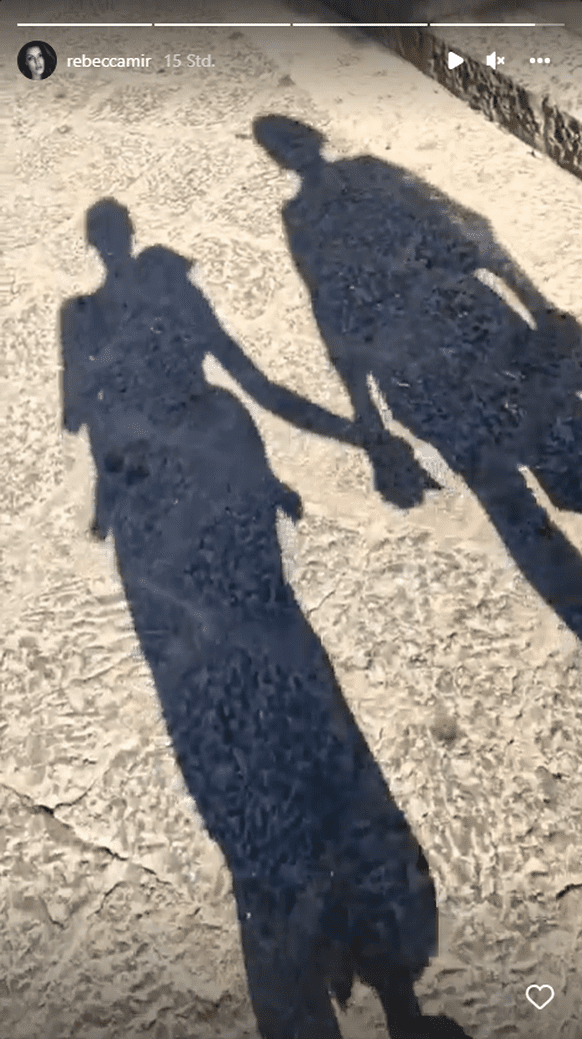 Rebecca Mir shares a video that shows the couple's shadow walking side by side.