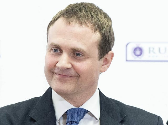 Tom Tugendhat attends a press conference.