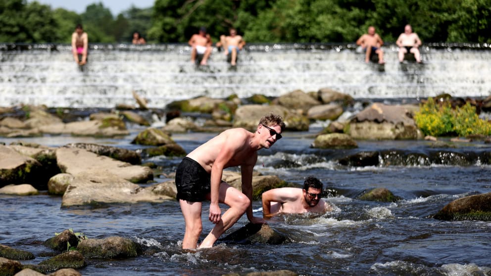 Derbyshire, UK: People enjoy the serenity of the Derwent River