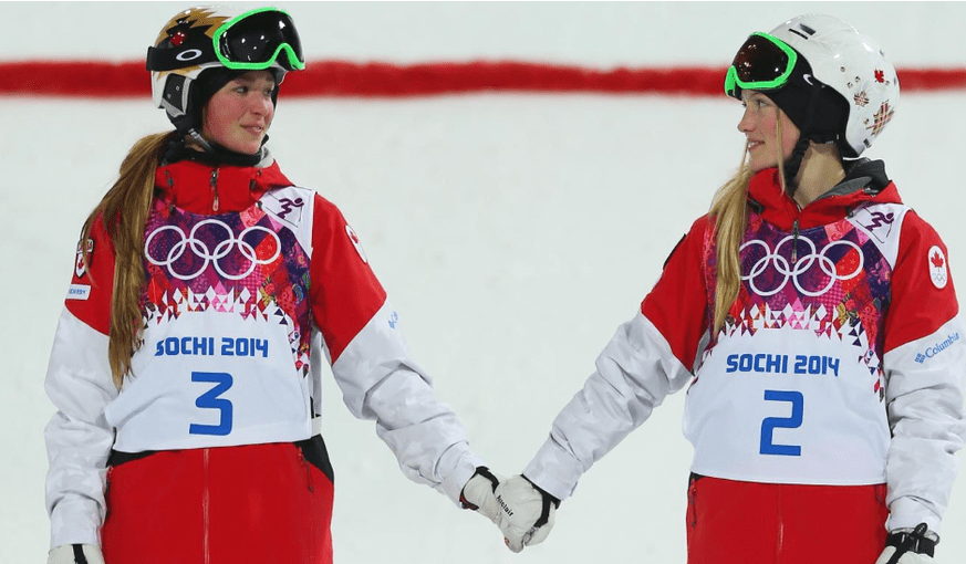 Chloe (left) with her sister Justine Dufour-Lapointe after her Olympic victory in Sochi in 2014.
