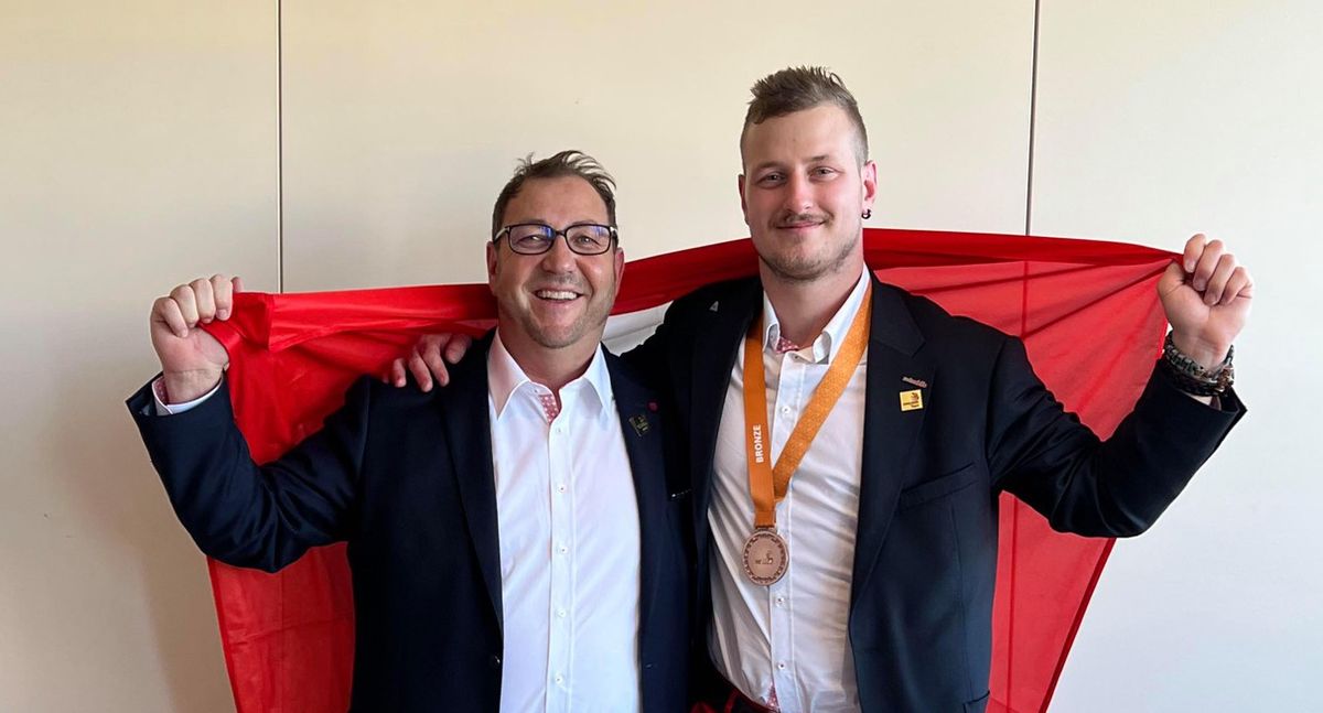Delighted to win bronze at the World Skills in Bordeaux: Plasterer Adrian Butler (right) with his coach and boss Rudolph Moshing, Grunt B.  Gestadt