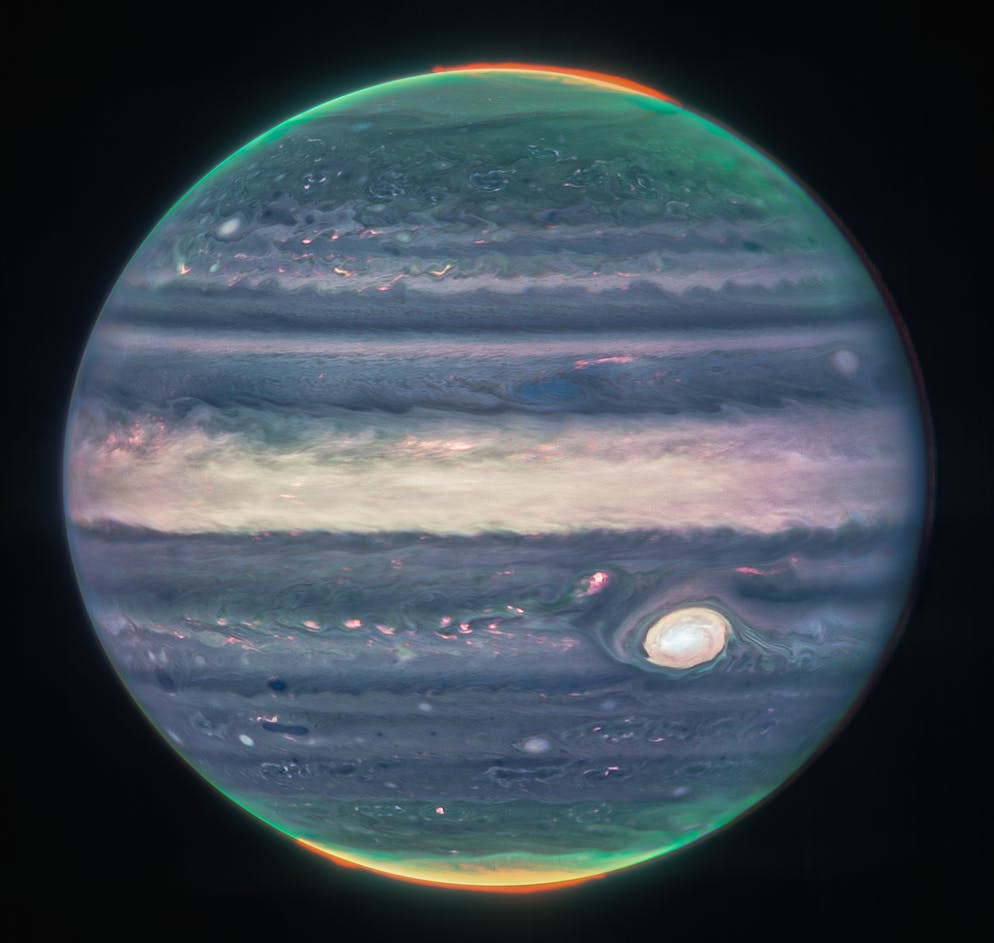 New James Webb photos.  Huge storms rage on the surface: A remarkable composite image of Jupiter including the aurora borealis over the poles, captured by the NIRCam camera with three filters. 